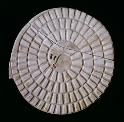 Egyptian snake-shaped gaming board, used for the serpent game “Mehen”, 3rd century BC